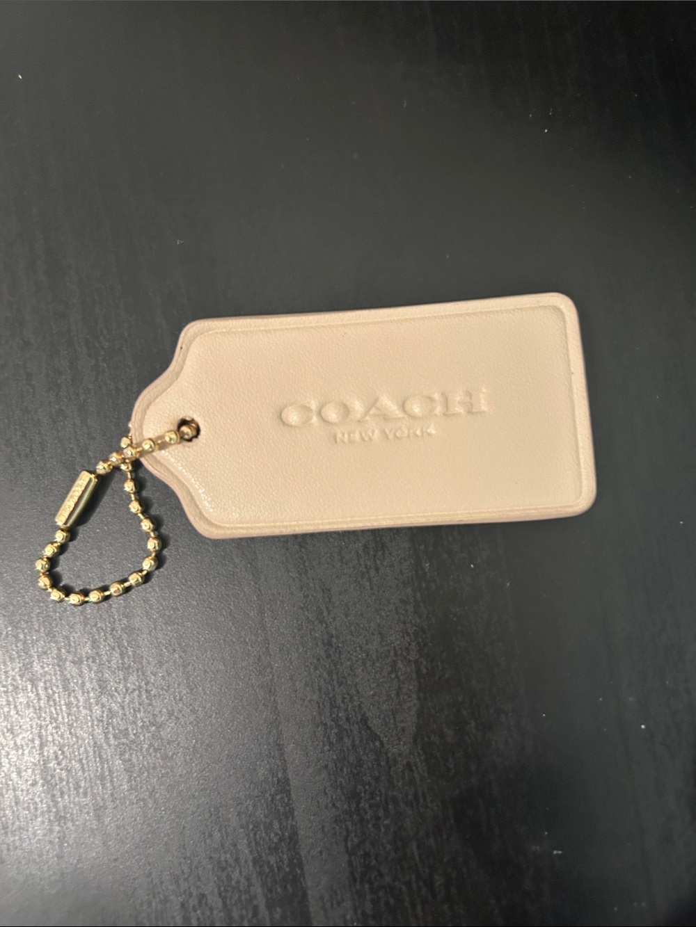 Coach Beige Leather Tag with Ball Chain
